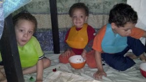 happy boys in fort